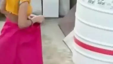 Bhabhi outdoor bathing secretly captured by neighbor