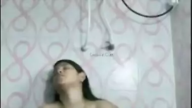 Excited Indian lassie has no choice but to masturbate in the shower room