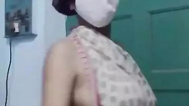Saree without a bra and a blouse.