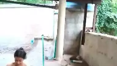 Teen Desi skinny doesn't know a voyeur films her taking a XXX shower