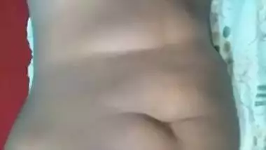 Dude plays with big XXX tits of his naked Desi wife for home video