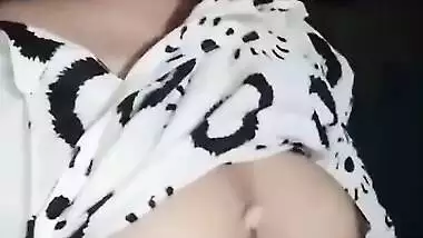 Cute college girl showing her small boobs