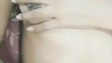 Cute girl play with her boobs and pussy