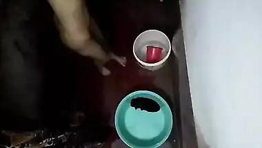 Hidden footage of naked XXX Desi housewife relaxing in the bathroom