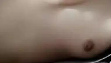 Cute skinny girl showing her small tits on VC