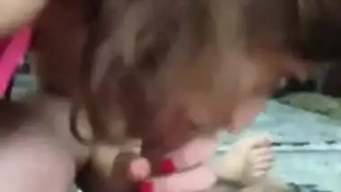 Beautiful girl sucking lover cock