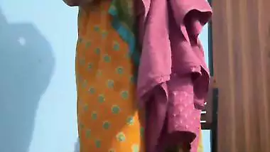 Curvaceous Indian girl removing saree and nude show