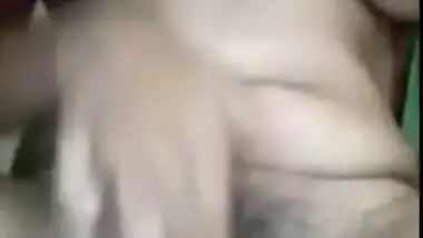 Indian female spreads her legs exposing sex pussy and XXX jugs