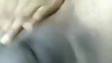 Sexy girl using selfie stick