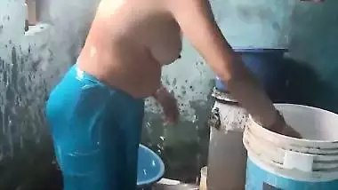 Mature aunty topless bathing caught on camera