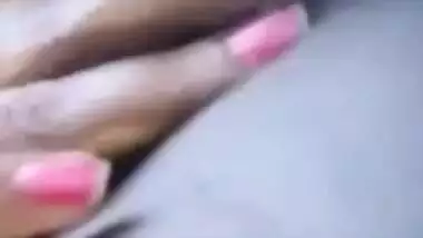 Horny Desi beauty spreads legs to finger her XXX pussy on alone