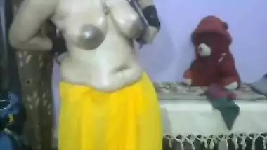 HORNY STEP MOM OPENING BLOUSE OILING HER BOOBS SEDUCEING