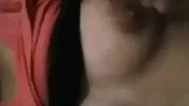 Pink T-shirt is pulled up so Indian sex girl can boast about her XXX tits