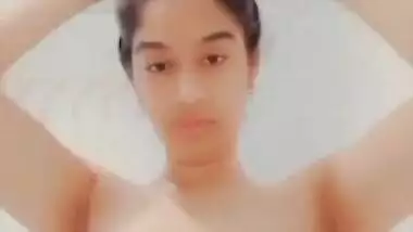 Cute girl making video for lover