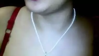 Sexy dark-skinned Indian girl shows up large breasts in the porn video